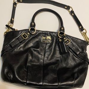 Black leather Coach purse with attached strap